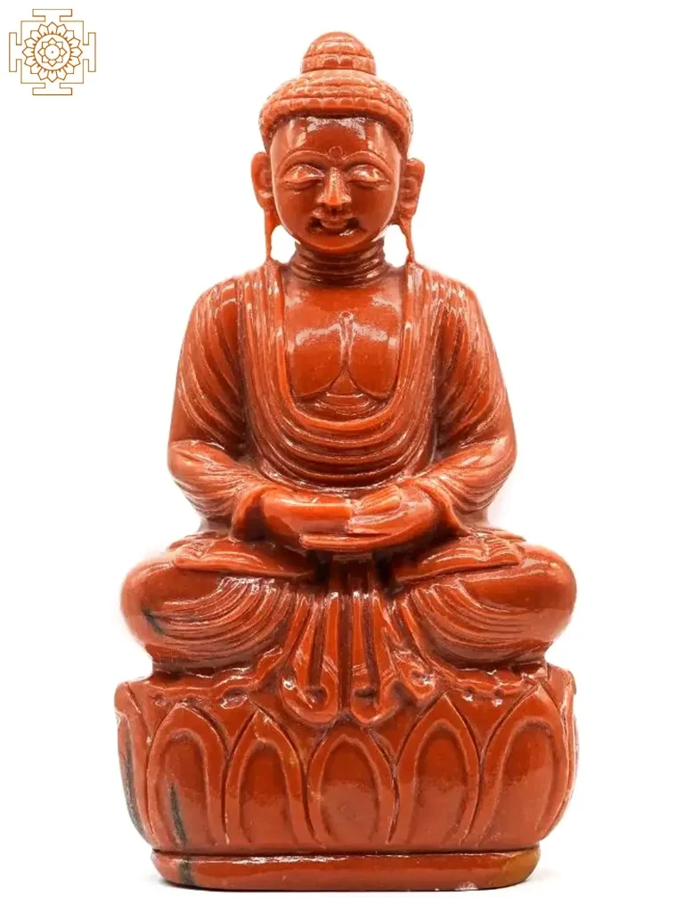 a statue of a person sitting on a white background made with Red Aventurine 